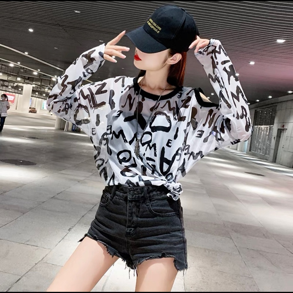 Shoulder cut out top